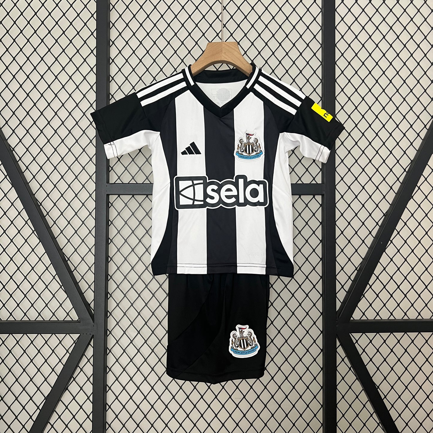 Kit Infantil Newcastle Titular 24/25